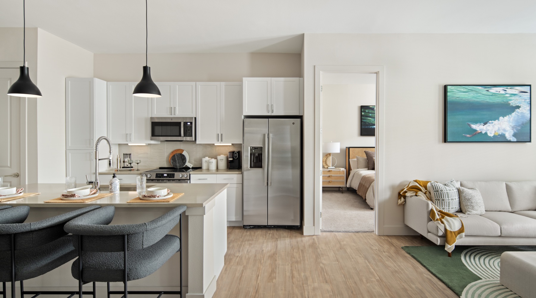 kitchen and living room with bedroom in the back 